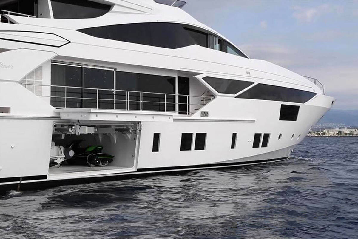 Side garage for tender, jet skis and water toys