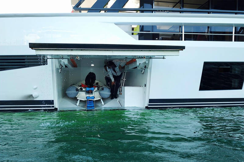 Side garage for tender and water toys