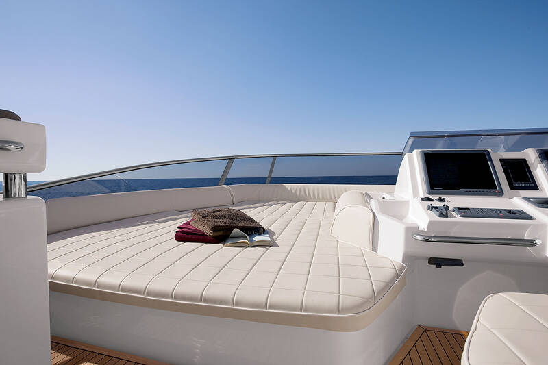 Great sunbed next to helm station on the flybridge
