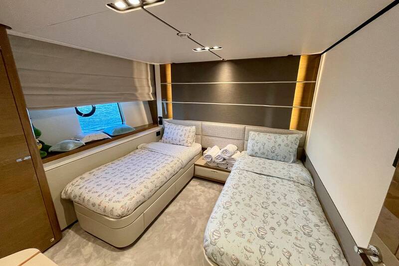 Guest cabin with two single beds on the port side